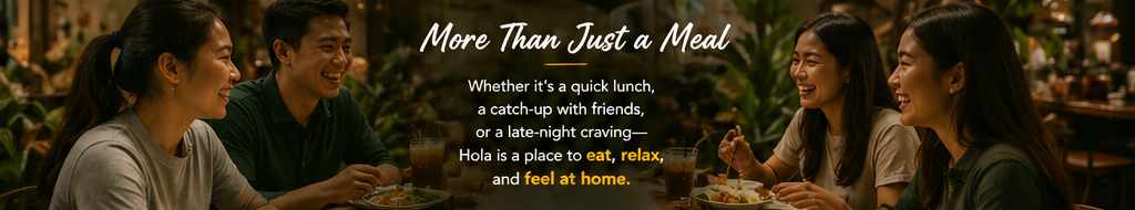 Friends sharing a meal at Hola Hola Kopitiam